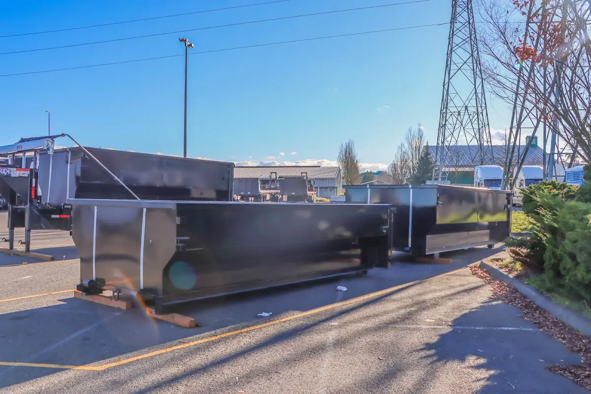 Roll-off dumpster ready for waste disposal at job site for 4 Yard Dumpster Rental in Broken Arrow